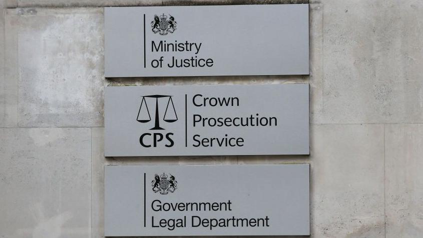 Signs which say the Ministry of Justice, Crown Prosecution Service and Government Legal Department