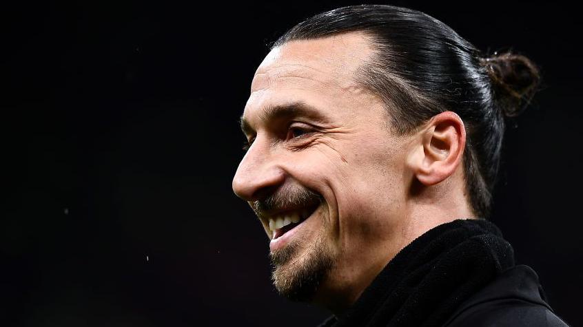 Zlatan Ibrahimovic smiles during an AC Milan game