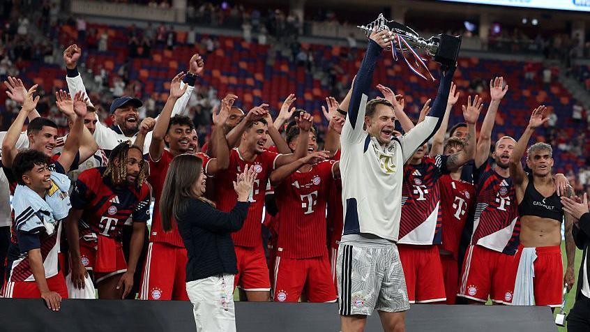 Manuel Neuer with a trophy