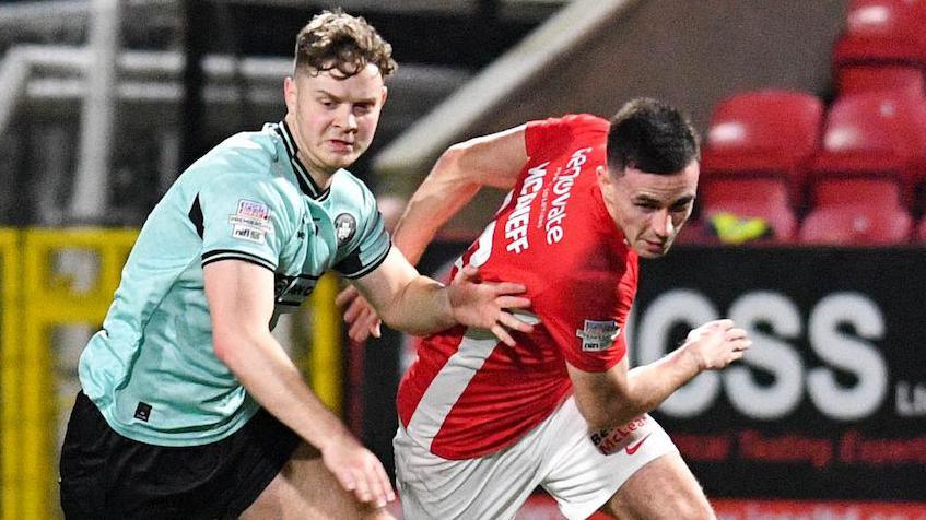 Harry Wilson challenges Jordan McEneff