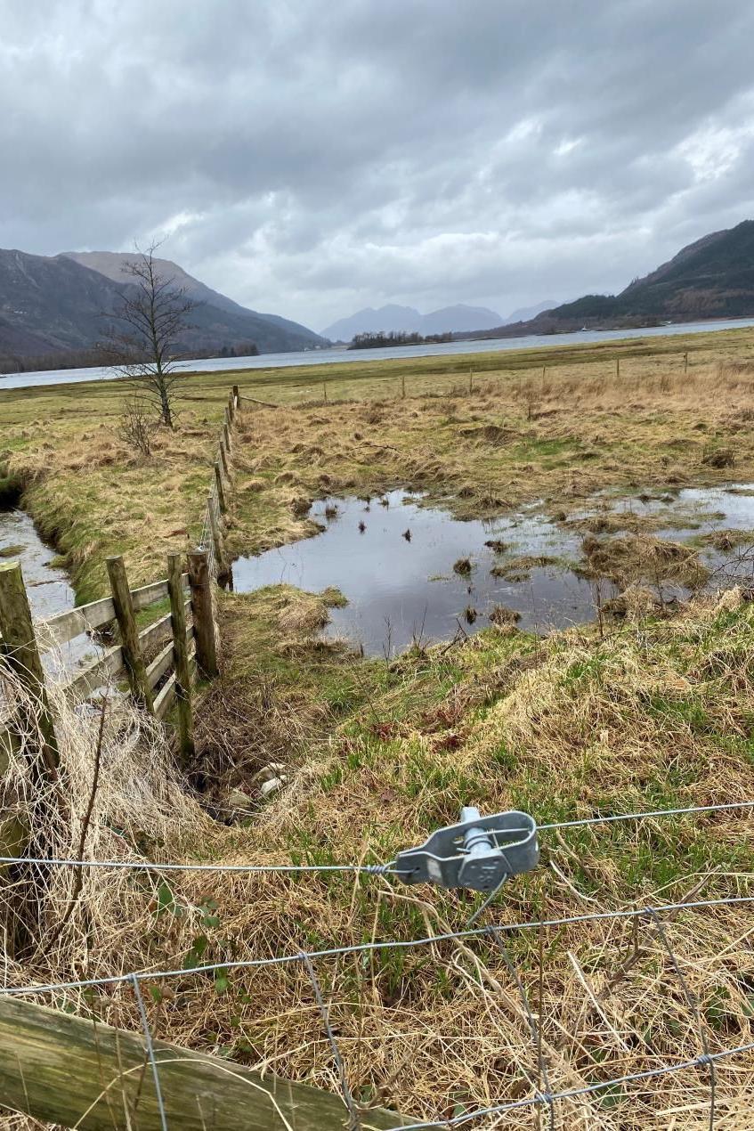 Làrach an leasachaidh air taobh an iar a' bhaile