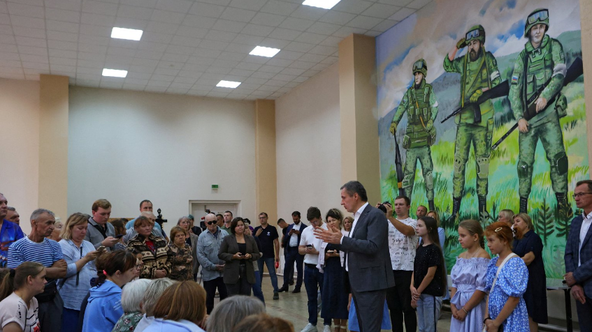 Vyacheslav Gladkov, governor of the Russian Belgorod region, talks to evacuees who left their homes following the Ukrainian advance into the area