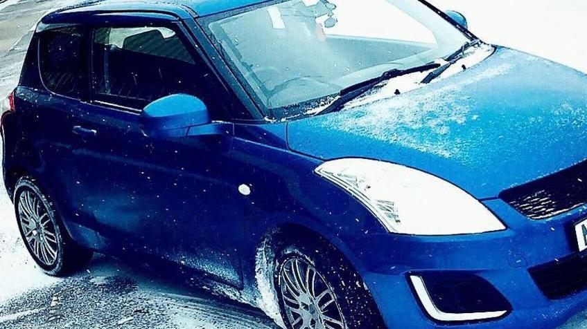 Marcus Johnson's blue Suzuki Swift seen in the snow