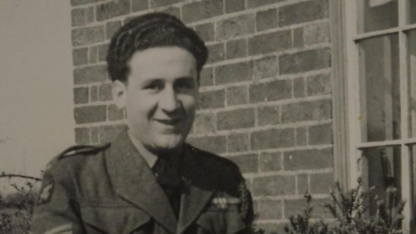 A black and white photograph of Douglas Cracknell when he was in the military.