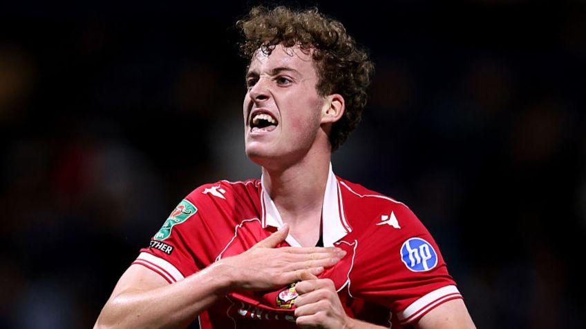 Wrexham's Harry Ashfield celebrates