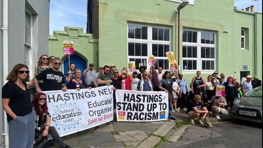 Demonstrators outside Hastings Mosque on Sunday