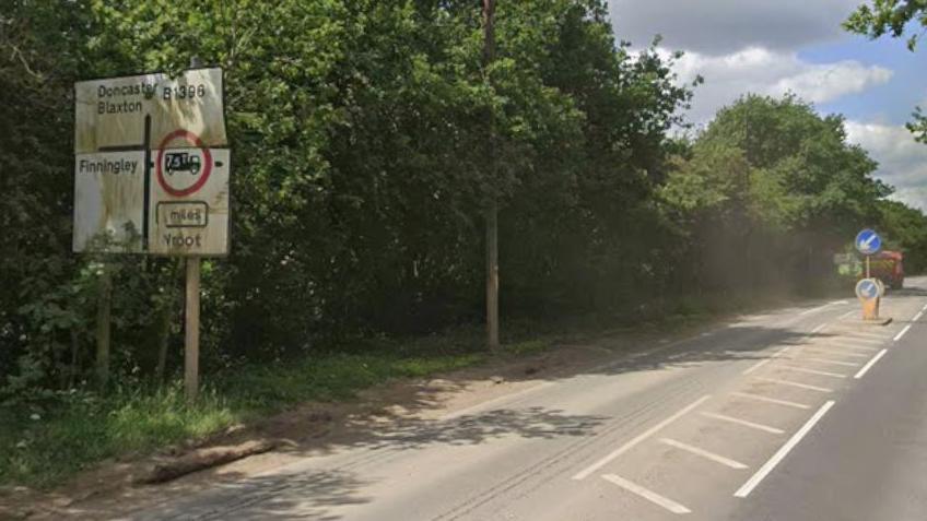 A road sign which provides directions for Blaxton and Doncaster.