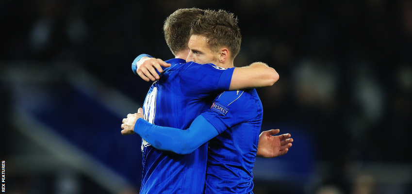 Andy King and Jamie Vardy celebrate after Leicester reach the knockout stages of the Champions League