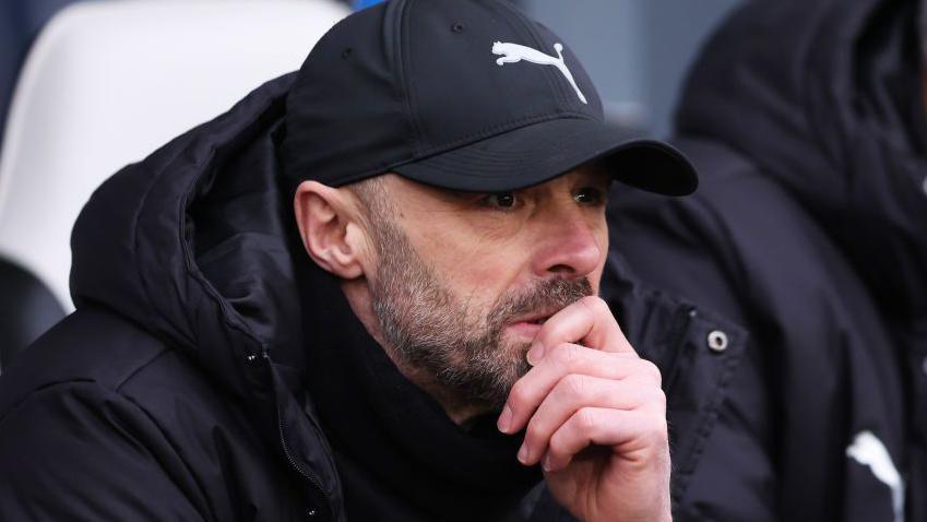 Derby County boss Paul Warne looks on from the touchline