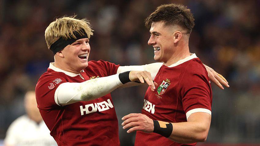 Lions captain Dan Sheehan (right) celebrates his try with Henry Pollock