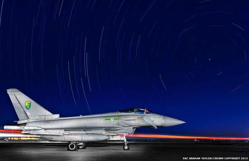 A Typhoon aircraft under a starlit sky in the Middle-East during a multi-national training exercise