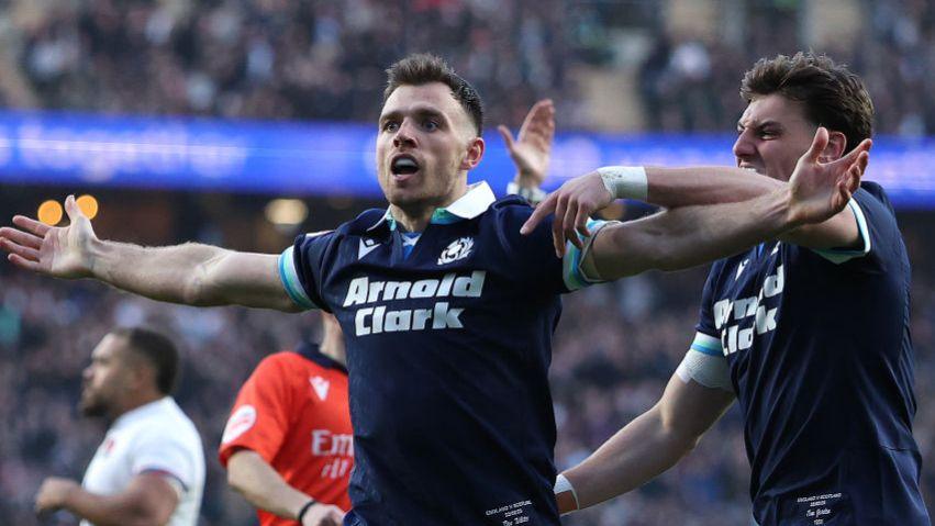 Ben White celebrates scoring a try for Scotland against England in the Six Nations