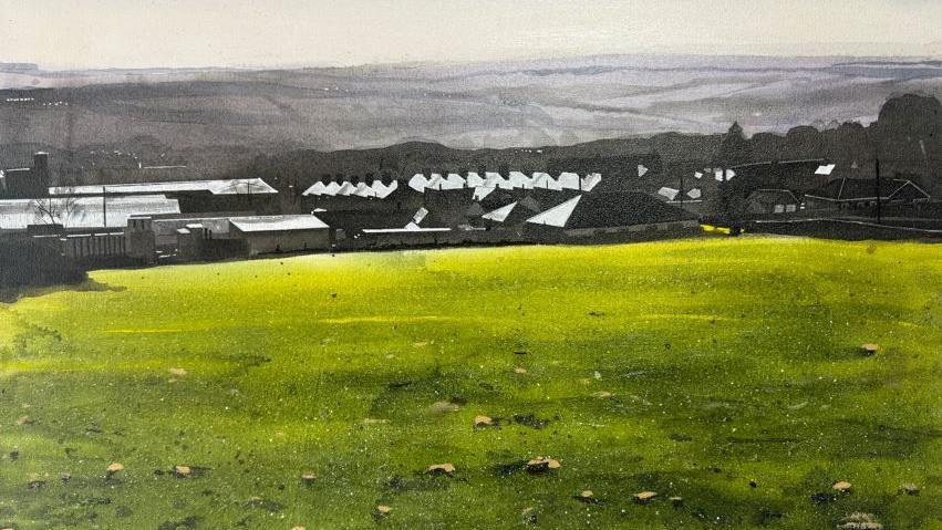 A painting called "We were at the sharp end, us" of a field of green with rocks scattered on it. In the background there are grey and black houses.