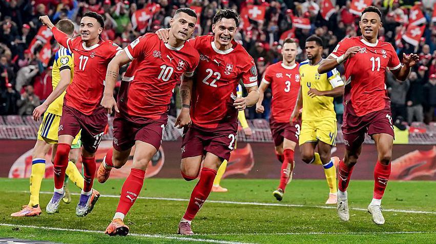 Granit Xhaka celebrates scoring for Switzerland with his team-mates