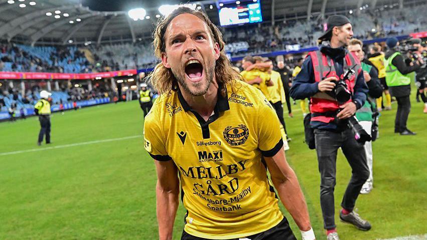 Mjallby players celebrate after the 2-0 win against IFK Gothenburg on Monday which clinched the Allsvenskan title