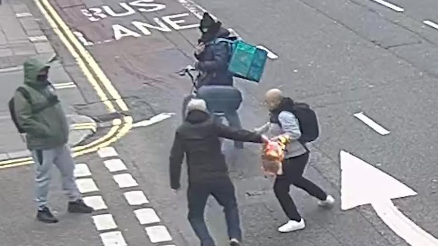 Still from undated handout CCTV footage issued by the Crown Prosecution Services (CPS) of Moussa Kadri (second left), attacking a man in Knightsbridge, on February 13, who was burning a copy of the Koran outside the Turkish consulate. Moussa Kadri was handed a 20-week prison sentence, suspended for 18 months at Southwark Crown Court on Tuesday. Issue date: Tuesday September 23, 2025.