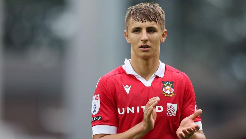 Max Cleworth clapping after a match with Shrewsbury in September