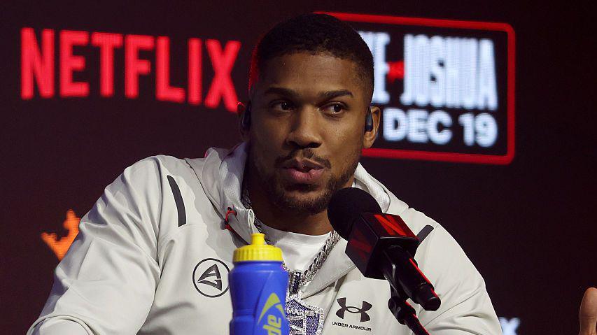 Anthony Joshua speaks at a news conference