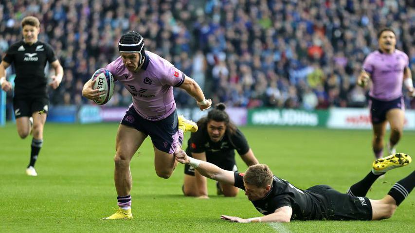 Darcy Graham scores for Scotland against New Zealand in 2022