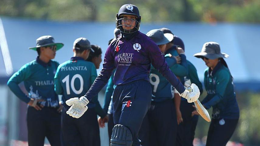 Abtaha Maqsood of Scotland walks off after being bowled out for two runs