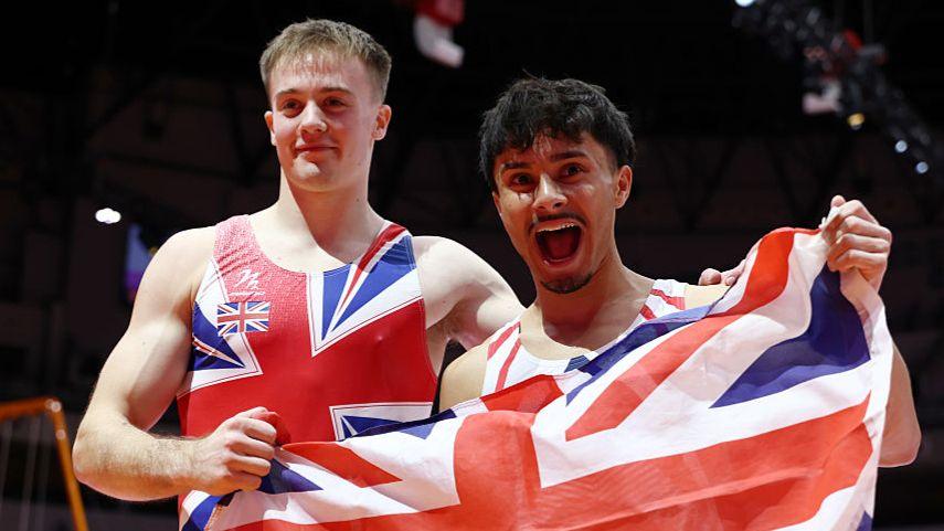Gold medalist Jake Jarman (R) and silver medalist Luke Whitehouse (L)