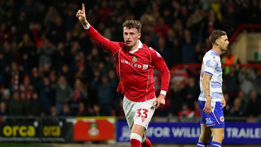 Wales forward Nathan Broadhead celebrates