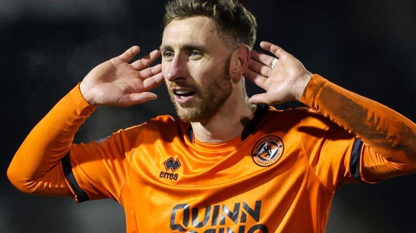 Dundee United's Louis Moult celebrates