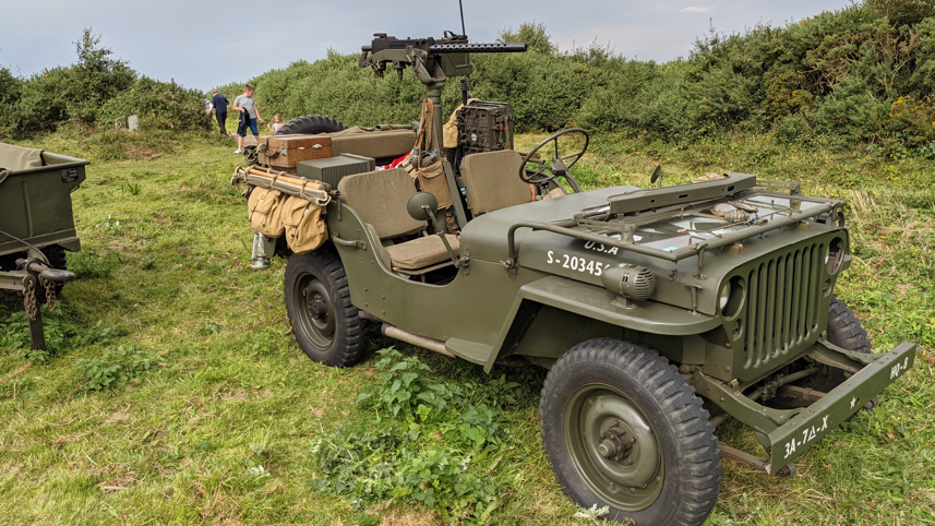 A green American World War Two vehicle