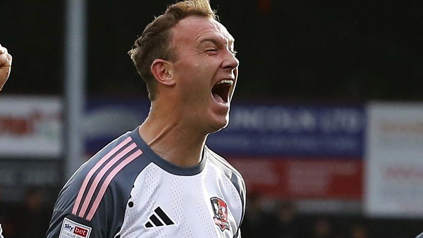 Kevin McDonald celebrates scoring for Exeter City