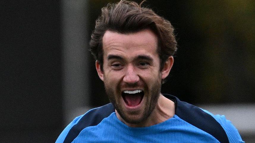 Ben Chillwell laughs during training for Chelsea