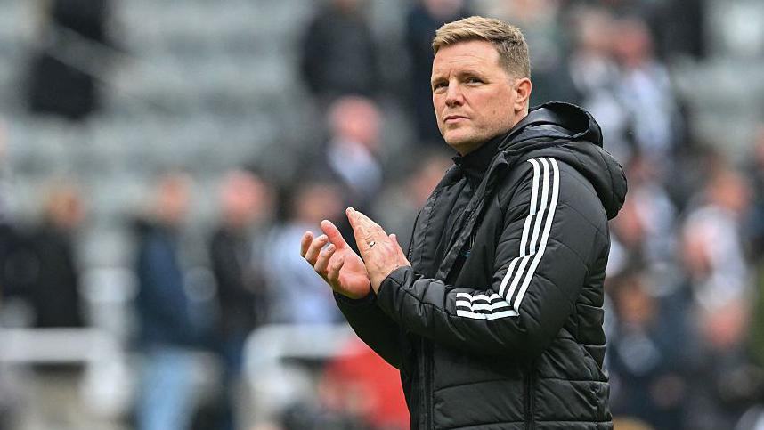 Eddie Howe applauds supporters after Newcastle United's game against Sunderland at St James' Park