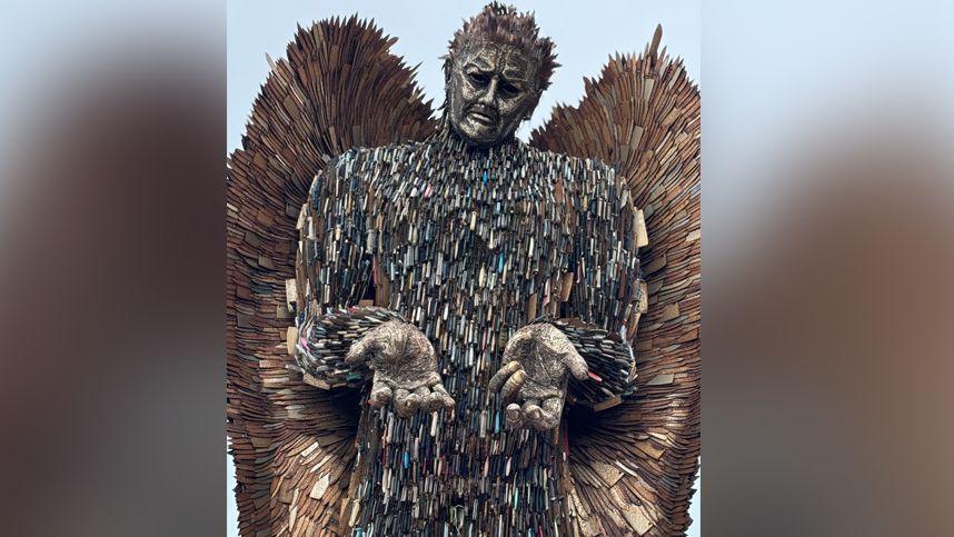 Image of a knife angel that has been made out of knives