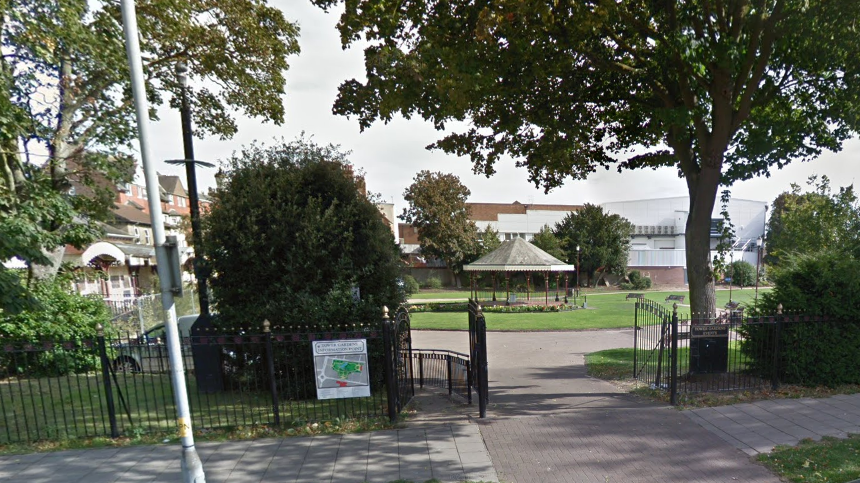 A Google Street View screen grab of Tower Gardens in Skegness, with a map, entrance gates and bandstand in the background.