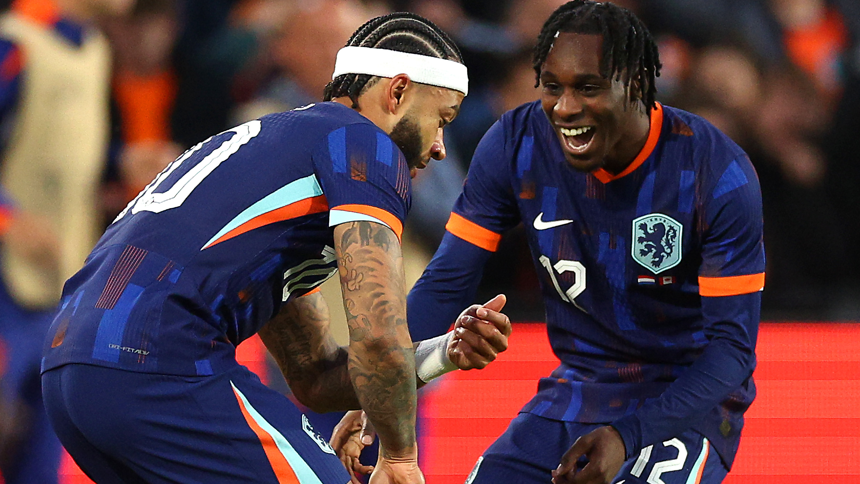 Netherlands defender Jeremie Frimpong (right) celebrates a goal during a friendly match against Canada
