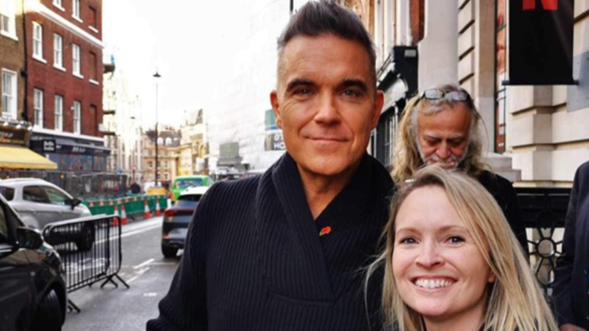 Lucy Champion with Robbie Williams