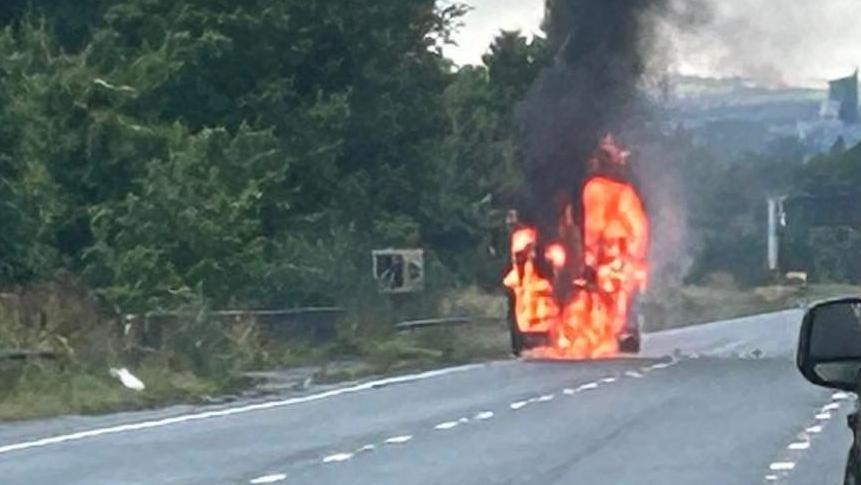 Crane on fire on A38 Plymouth