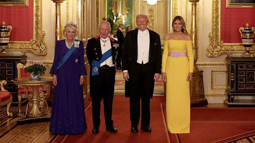 Queen Camilla and King Charles III stading next to US President Donald Trump and First Lady Melania Trump.