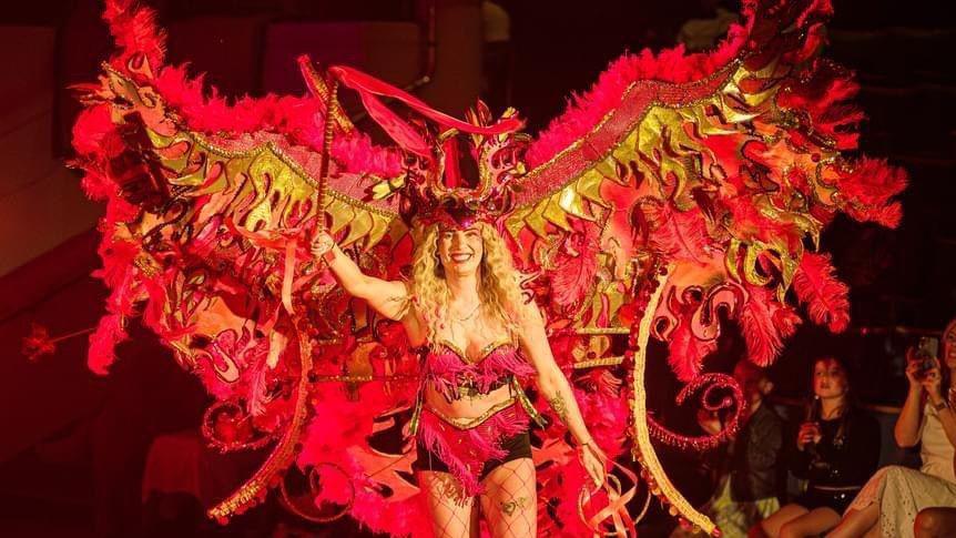 Michelle Harding-Foster in her red costume for Leicester's Caribbean Carnival