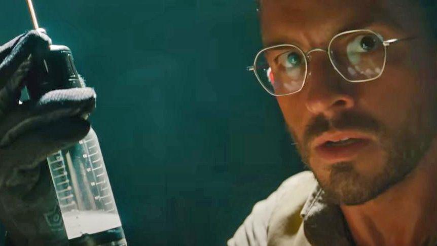 Jonathan Bailey in character in a promotional still of the film Jurassic World: Rebirth (2025)