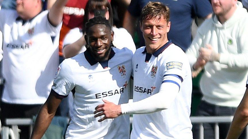 Omari Patrick (left) celebrates his goal for Tranmere Rovers