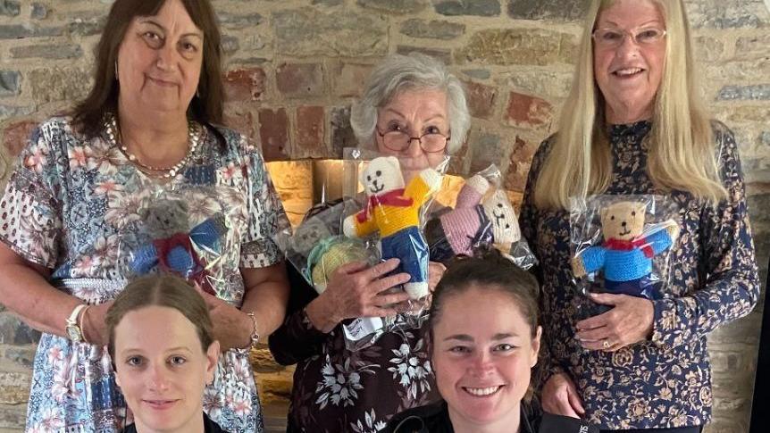 PCs Justine Lane and PC Alex Prentice with craft club members 