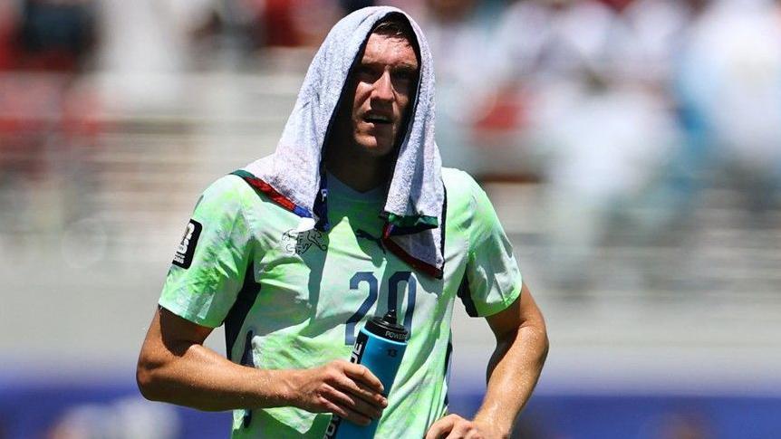 Switzerland's Michel Aebischer during a hydration break at the 2026 World Cup