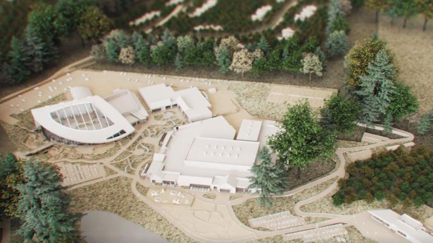 An overhead view of buildings in a forest in a 3D model of how Center Parcs first Scottish site might look