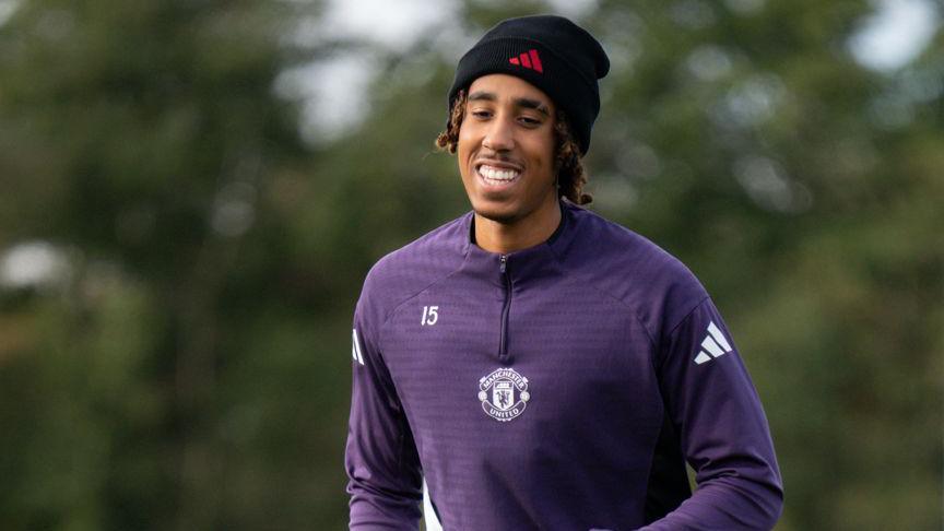Leny Yoro smiling during a Manchester United training session
