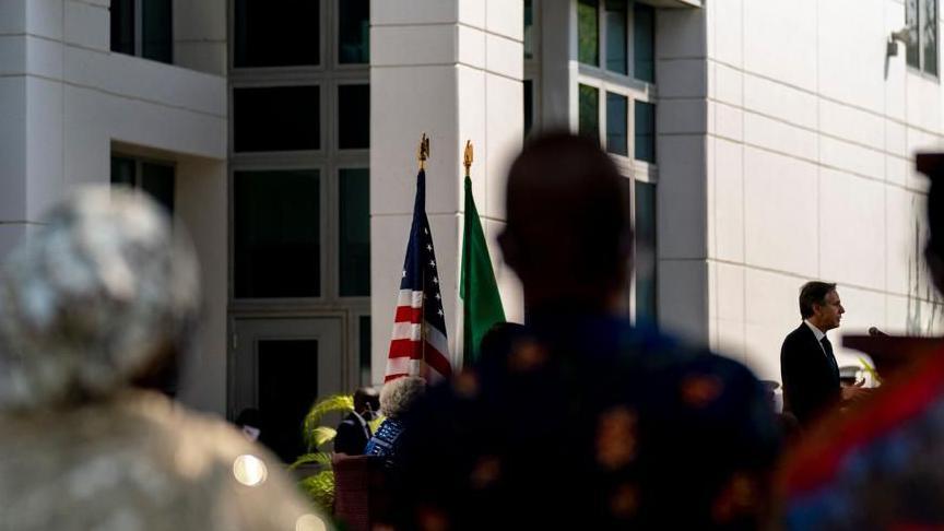 Some Nigerians watch as former US Secretary of State Antony Blinken speaks at the US Embassy in Abuja in 2021