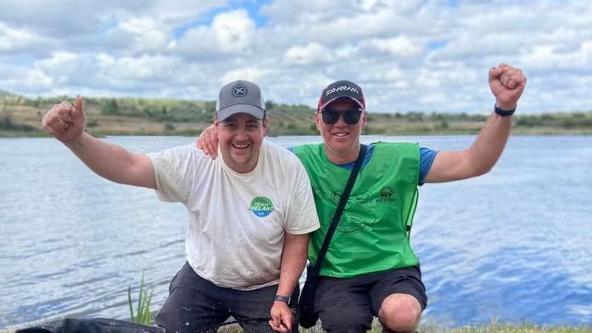 Johnny McKinley and Brenton Sweeney pictured in front of the water