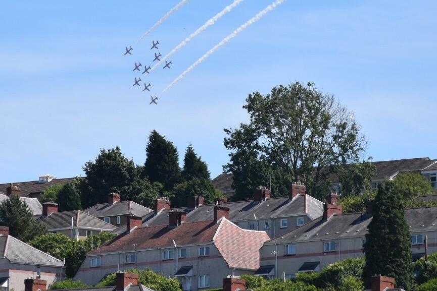 The Red Arrows over houses in Swansea