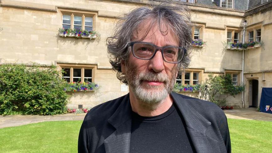 Neil Gaiman outside Pembroke College