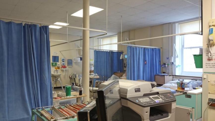 A cramped, cluttered ward in the Barry Building