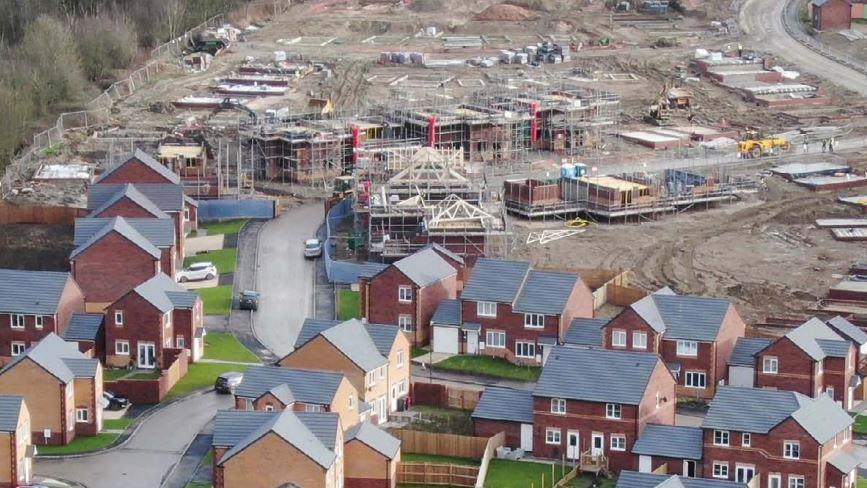 An aerial view of a new housing estate in Bolsover. Some homes are complete while others are being built.